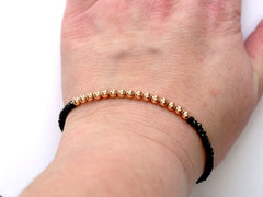 Black Spinel and 14k Rose Gold Bead Bracelet - 4mm - Women and Men's Bracelet - Model View