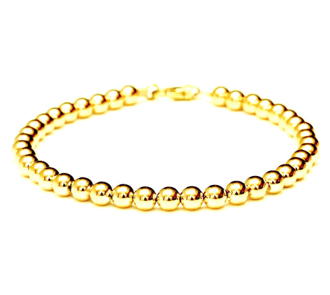 18k gold bead bracelet - 6mm.  Made with medium weight hard-wall beads for extra durability.  Bracelet for women and men.