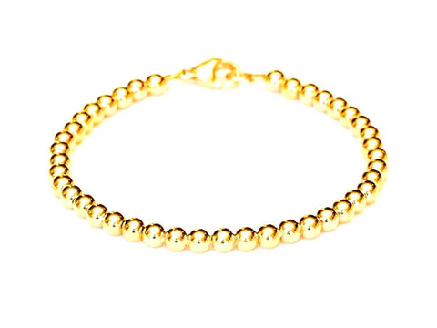 18k gold bead bracelet for men and women, 6mm, 4 grams.  Durable for everyday style to dress up or down.  Stack with other your other bracelets, or wear on its own.
